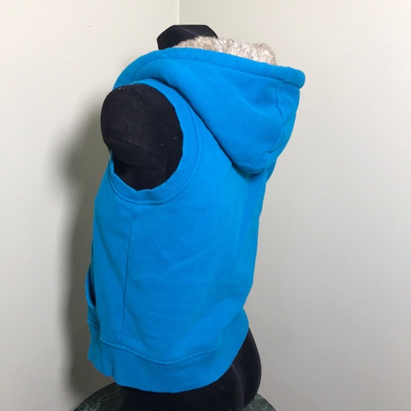 Sweater vest with faux fur lined hood. - Picture 2 of 7